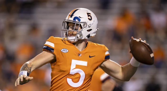 Virginia Cavaliers quarterback Brennan Armstrong (5) attempts a pass against William & Mary Tribe during the second half at Scott Stadium.